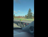 Truck on highway with small truck cargo
