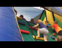 Little girl goes down inflatable slide fail 