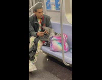 Man feed pigeon bird inside subway train