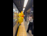Collab Subway Creatures - Pikachu inflatable mascot gets off the train