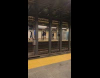 Guys play rock paper scissors across tracks 