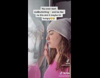 Girl looking out window might be hungry 