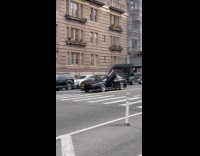 Car open scissor door drive slow street