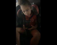 Little girl woken up in car 