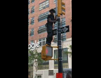 Pirate hat guy stands on light dances 