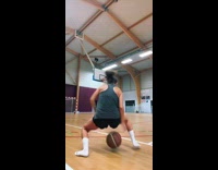 Girl does tricks and exhibition with basketball