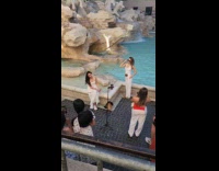 Three women white dress different fountain photoshoot