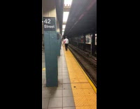 Pink purse lady walks barefoot subway platform 