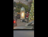 Woman Santa Costume photographer lie down ground