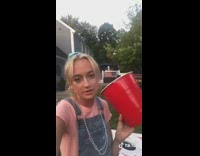 Girl jean overalls giant red cup