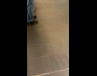 Person wearing alien costume at mall 