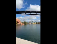 Woman interrupted by roller coaster ride