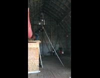 Guy jumps and pole vaults onto platform, metal pole bounces and hits him in the groin