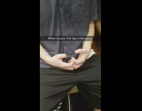 guy in a blue shirt making symbols with hands