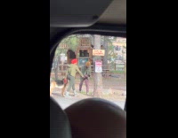 Woman with dog directs man to film