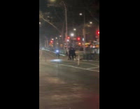 Santa chased by police runs on street