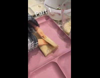 Girl makes tamale with tiny finger hands 