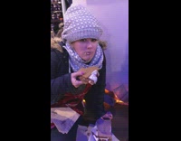 Woman eats smores mess all over face