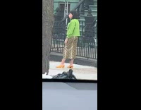 Green jacket snakeskin print skirt sidewalk girl 