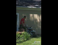 Red shirt man double decker stroller for cats