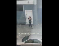 Man black shirt face mask brown paper bag tiktok dance sidewalk Part 5