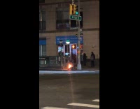 Fire on garbage bin on the street