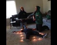 Three guys living room exorcism yellow beanie
