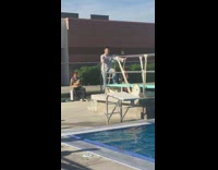 Button Down Shirt and Jeans Guy Jumps Into Swimming Pool