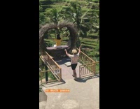 Girl yellow shirt raise arms heart chair