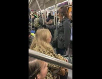 Guy sings on train portable speaker 