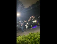 Woman brown tank top lie down car hood Part 2