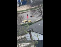 Girl pink skirt pose near yellow car