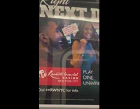 Handwritten sign taped to casino ad subway 