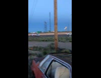 Police car chase truck towing boat broken tire