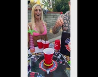 Woman shoots small ball into bowl 