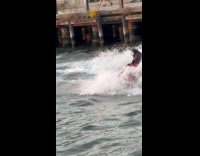 Collab WINY - Joker rides jet ski in east river 