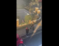 Girl black sleeves jump and dance street