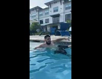 Man wears probation ankle bracelet at pool
