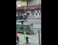 Man hold flag helmet horns walk street