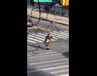 Black yellow dress dances sings crosswalk