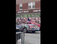 Collab WINY - Man drives graffiti car raps on microphone 