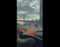 Collab WINY - Man on Scooter Overtakes Cars on Road - Bridge ahead