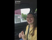 Guy tells red lobster joke to girl in yellow shirt in car 