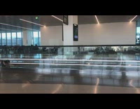 Lady swims across airport lobby