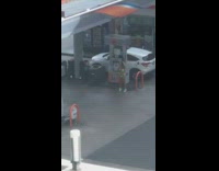 Girl green bikini gas station