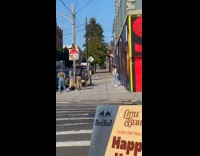 Collab WINY - Woman films dance video on the street