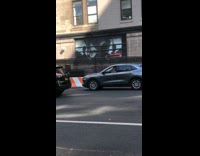 Man playing maracas while driving  