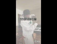 Man open and check heat in the oven