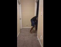 Guy tries to jump with feet on wall 