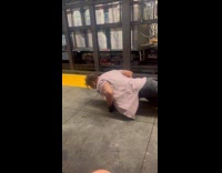 Collab Subway Creatures - Man knuckle push ups in subway platform